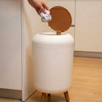 Compact plastic waste bin for home